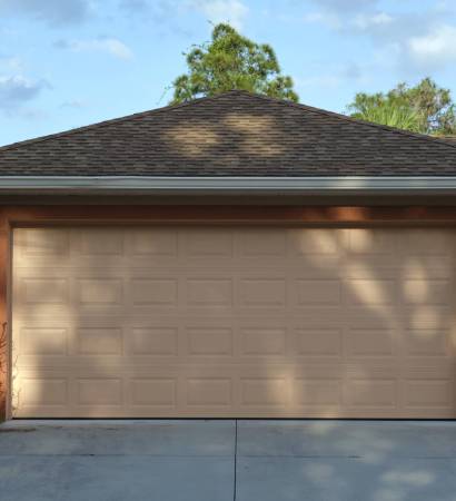 Wide garage double door and concrete driveway of new modern american house.